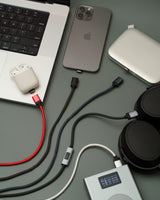 Connect Pro Magnetic Cable Set — desk flat lay with a laptop, phone, earbuds and power bank on charge — Chargeasap