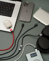 Connect Pro Magnetic Cable Set — desk flat lay with a laptop, phone, earbuds and power bank on charge — Chargeasap