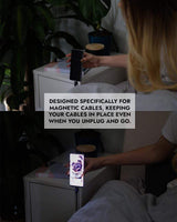 Woman using Chargeasap Magnetic Cable organizer with their Infinity magnetic cable
