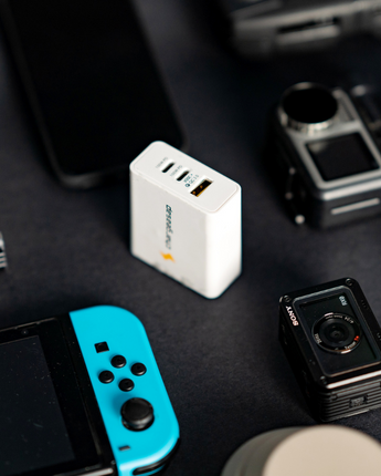 Omega 100W GaN Charger — white variant showing foldable wall prongs — Chargeasap