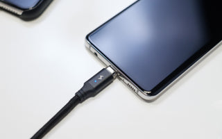Man recharging phone