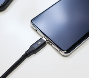 Man recharging phone