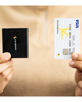 100W Omega USB-C GaN Charger in black  with credit card to show size comparison